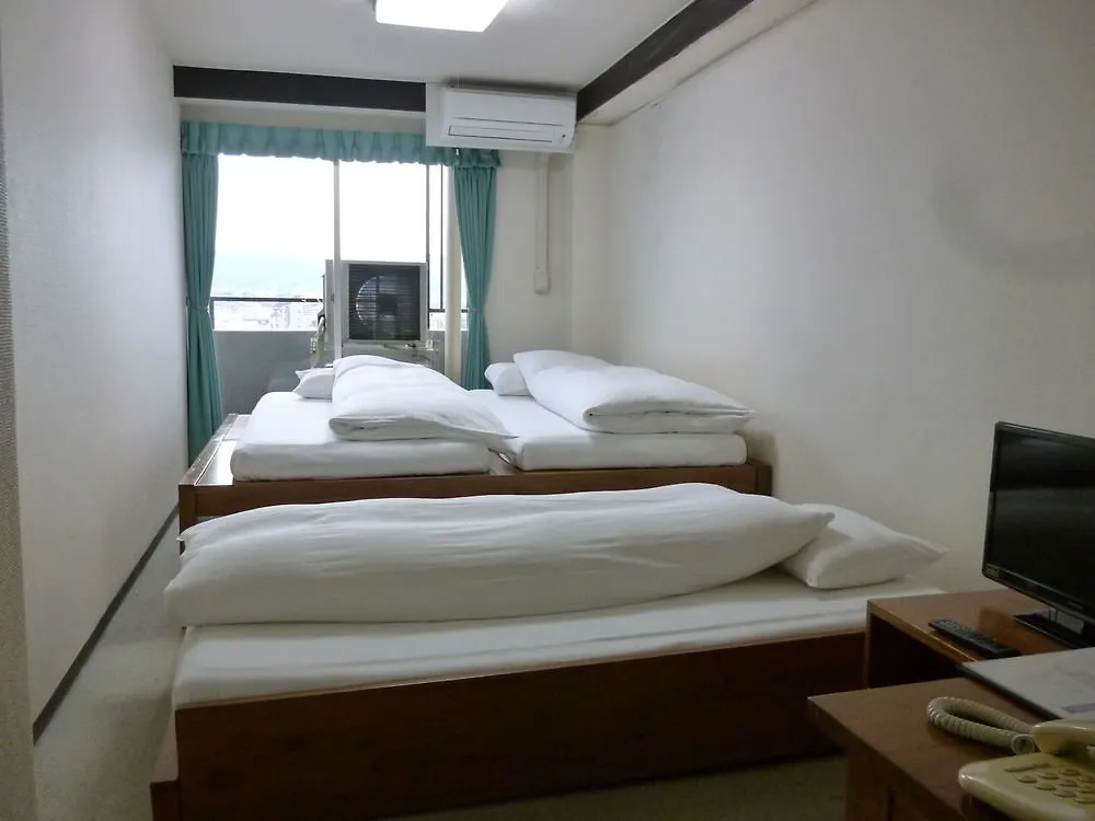 Econo-Inn Киото Отель